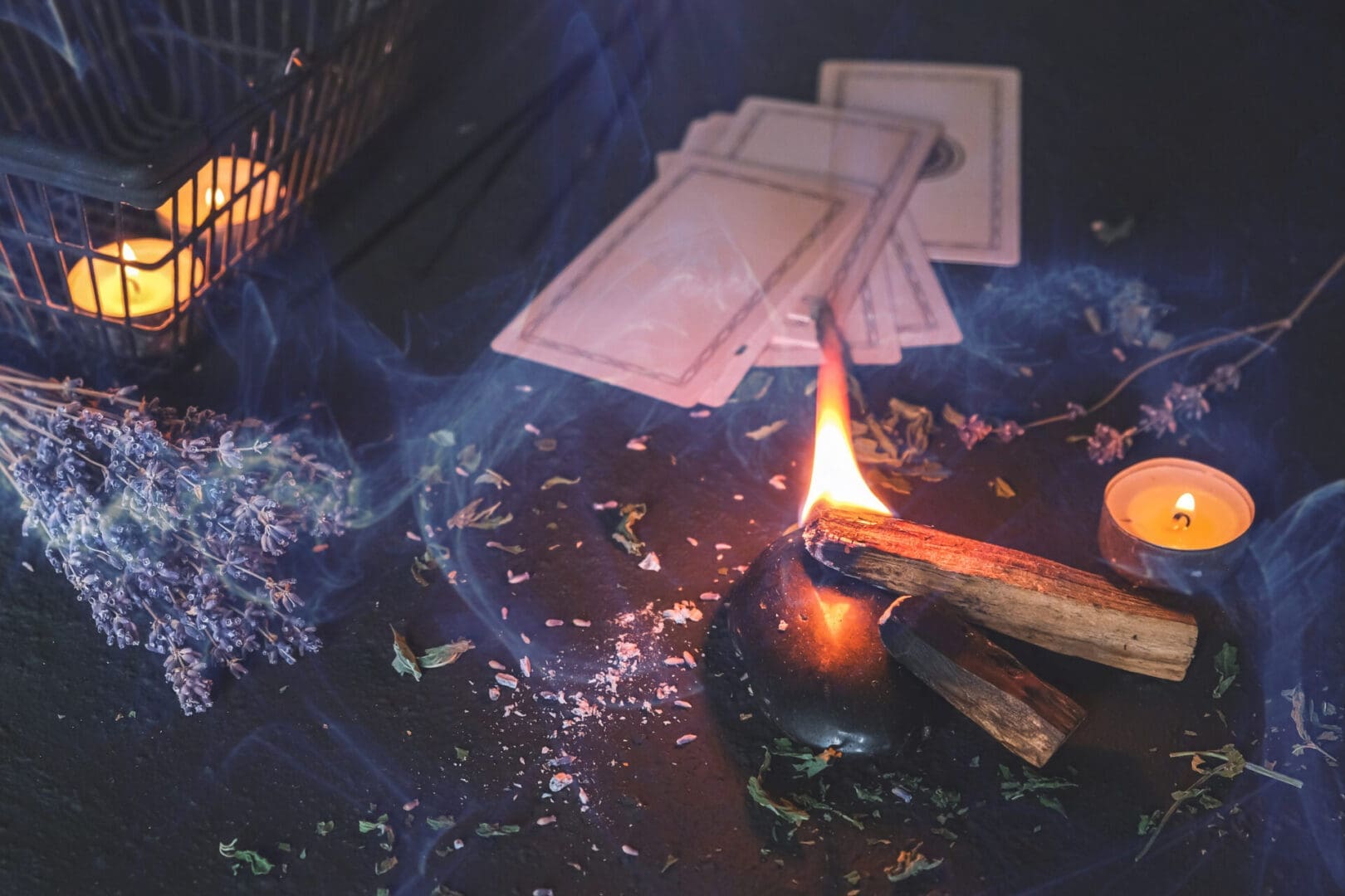 Esoteric, Occult mystical ritual scene of sorcery tarot candles, dried flowers, palo santo and tarot cards, ritual book. Witchcraft, mysticism and occultism,esoteric background