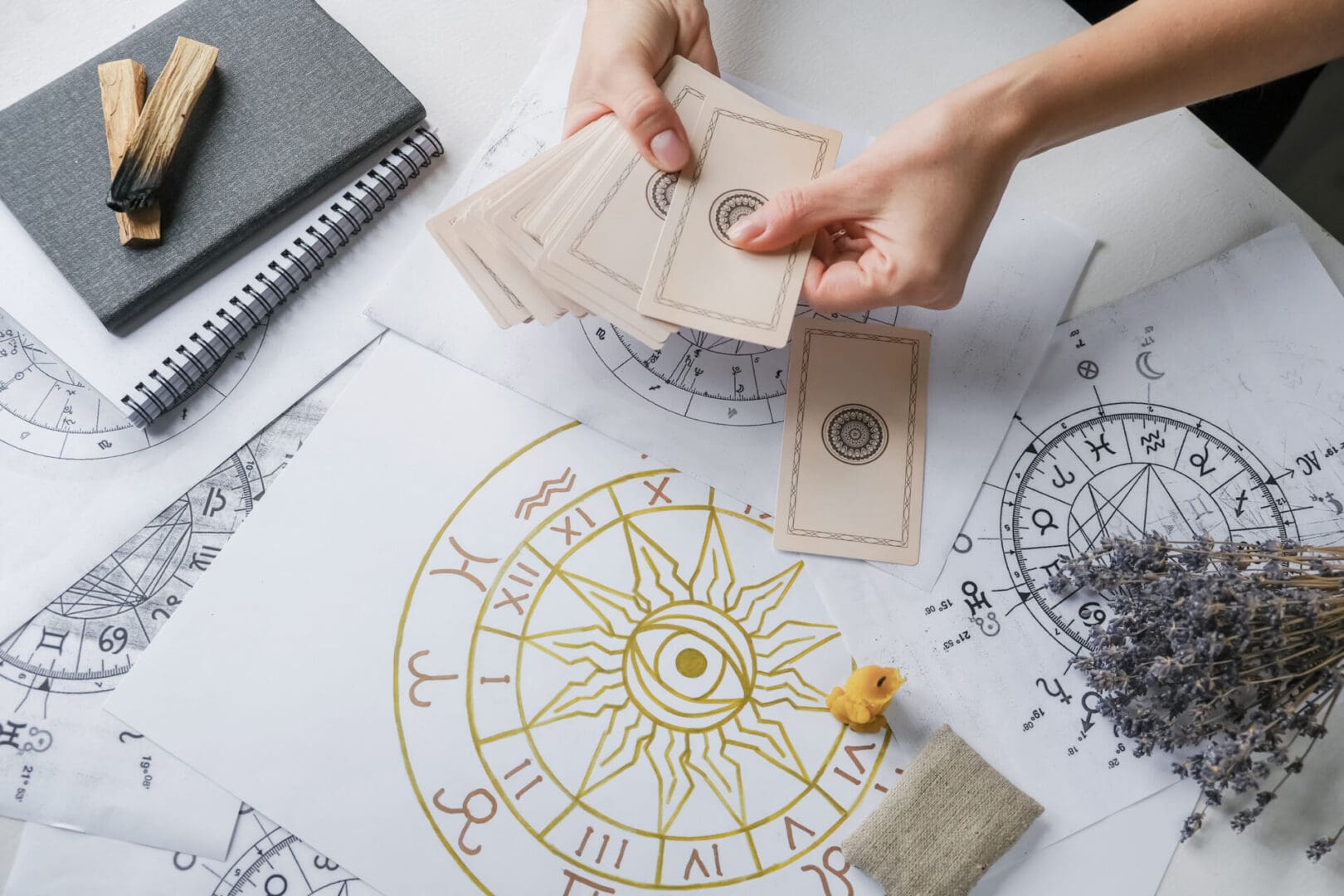 Astrology. Astrologer calculates  natal chart and makes a forecast of fate	Tarot cards, Fortune telling on tarot cards magic crystal, occultism, Esoteric background. Fortune telling,tarot predictions